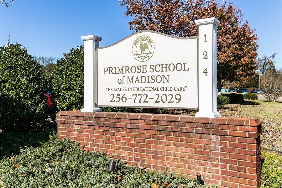 Primrose School of Madison sign on a brick base