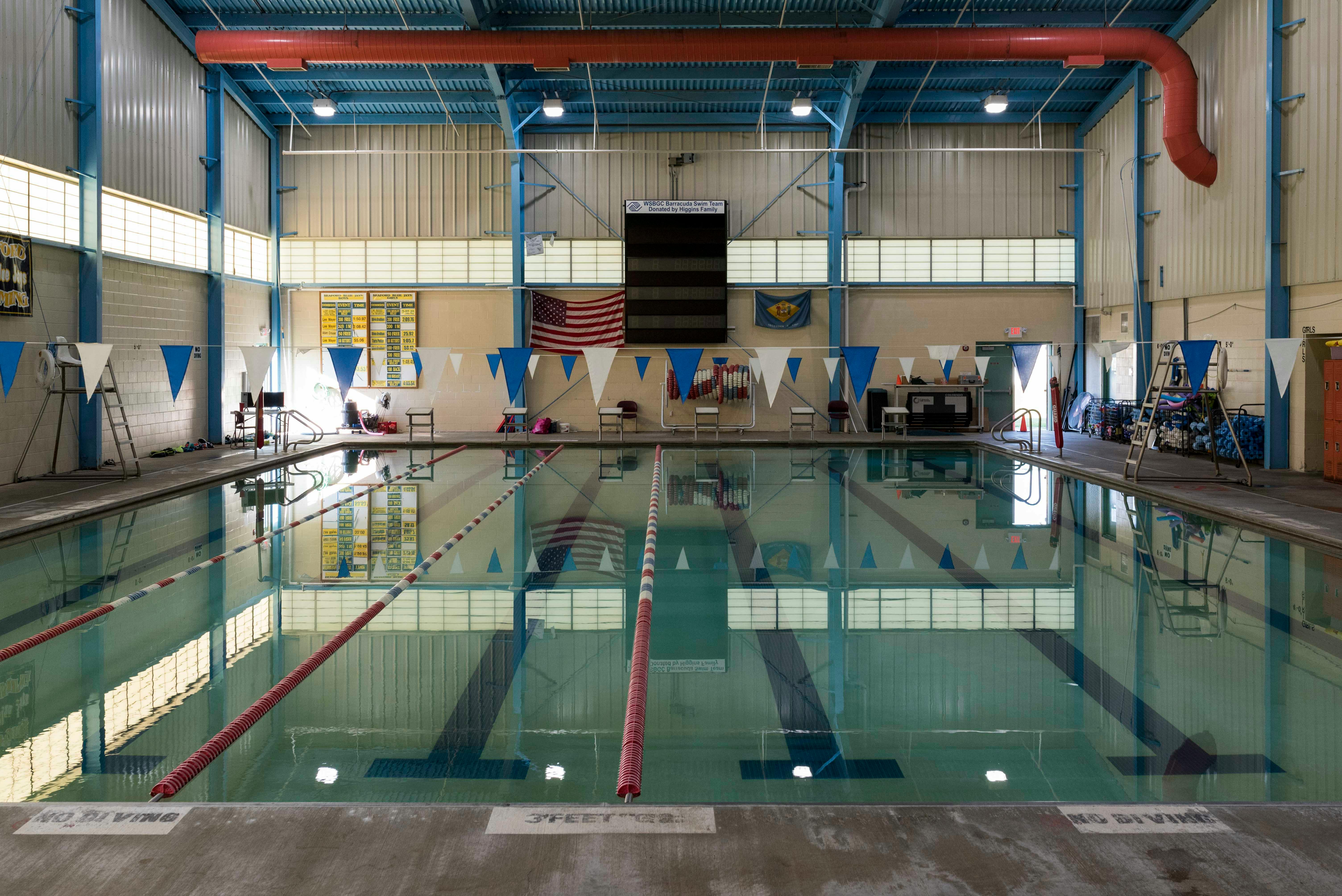 Indoor swimming pool with lane lines and starting blocks