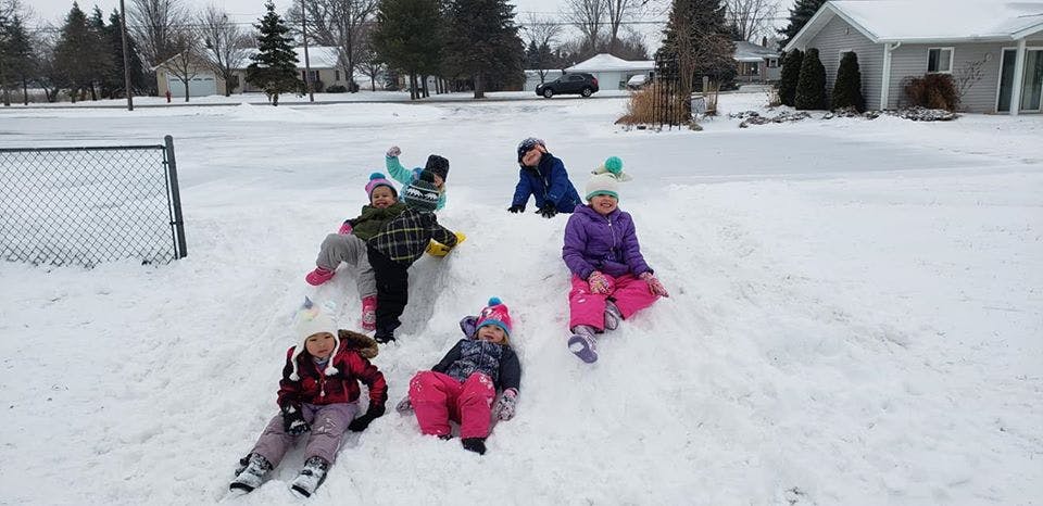 Children playing in the snow