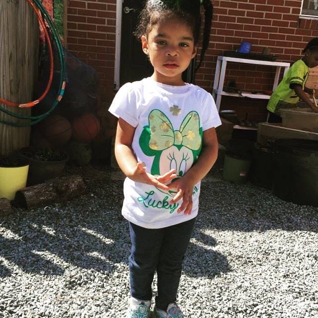 Child standing outdoors