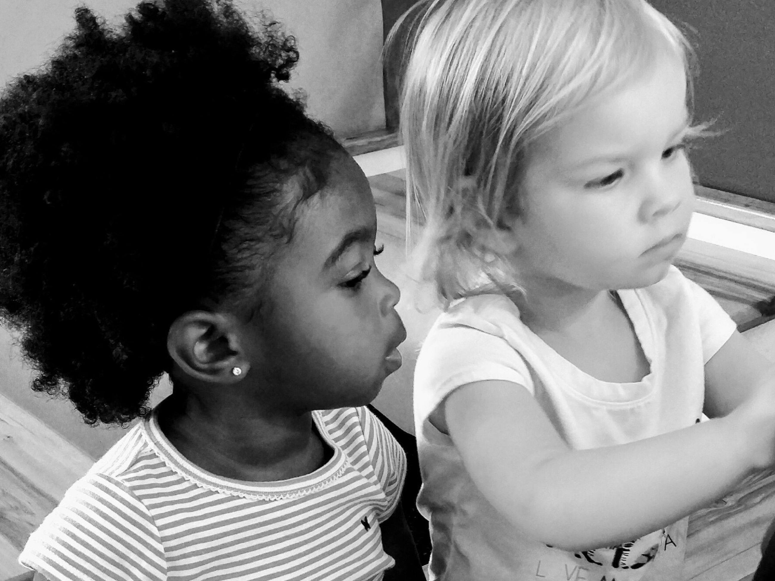 Two children looking to the right