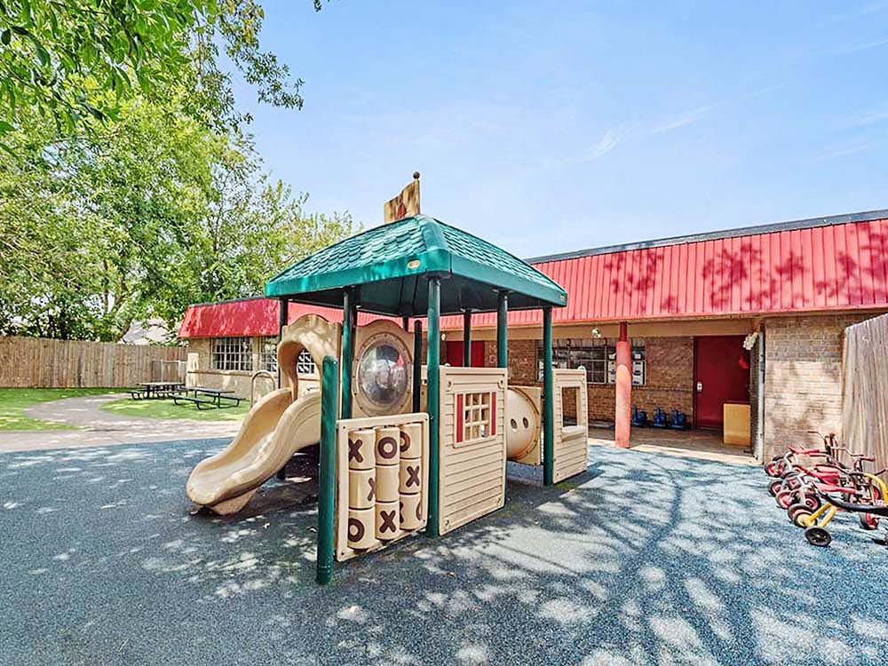 Playground with a slide and activity panels