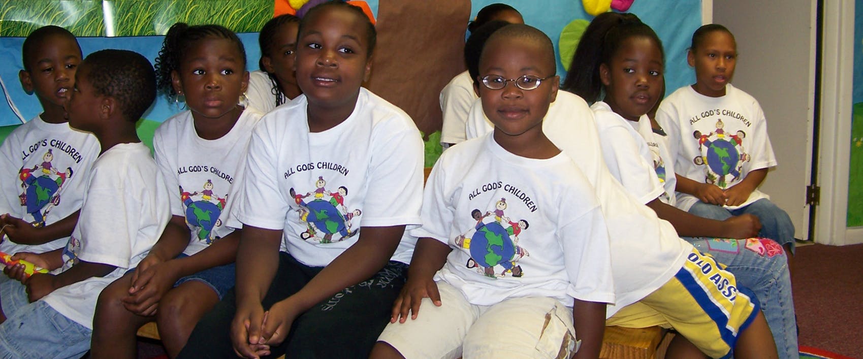 Group of children sitting together