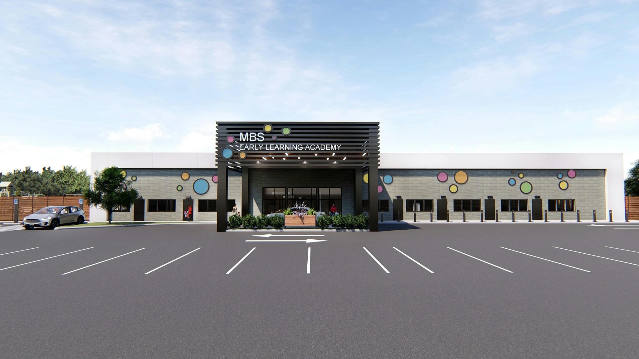Building with "Early Learning Academy" sign and parking lot