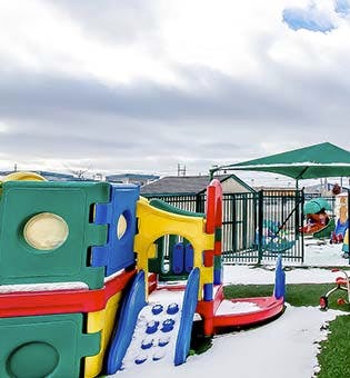 Playground with snow on the ground