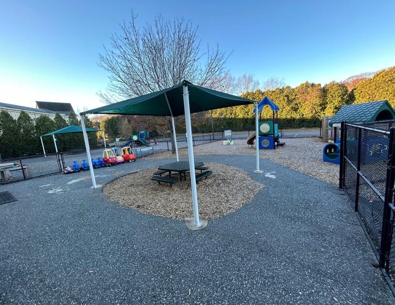 Empty children's playground with small ride-on toys