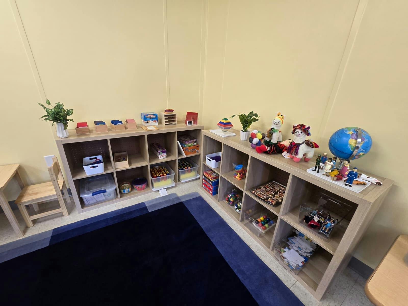 Classroom shelves filled with toys and learning materials