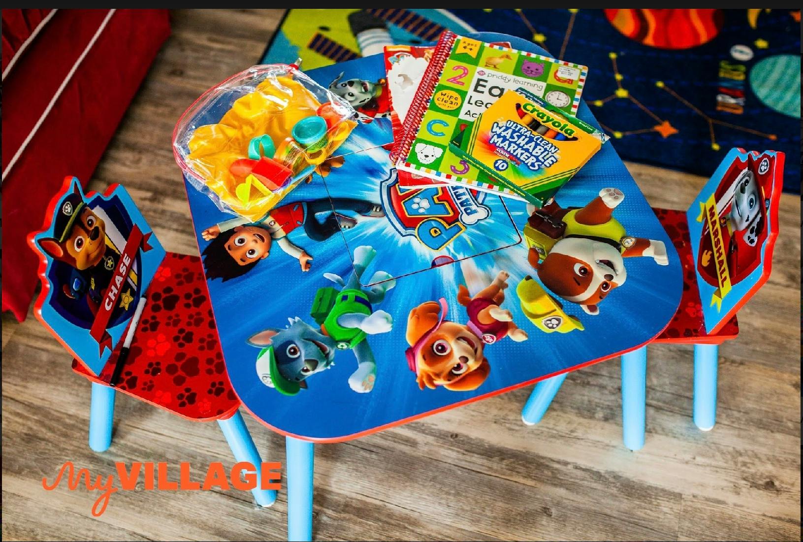 Children's table and chairs with cartoon characters and books