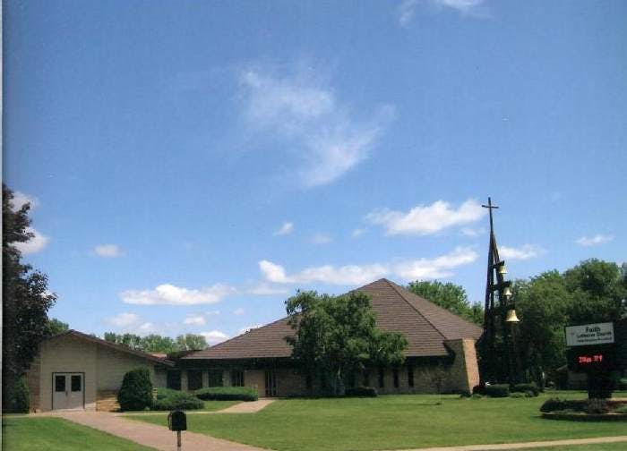 Church building with a bell tower and cross