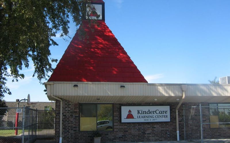KinderCare Learning Center building with red roof