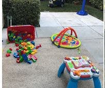 Children's toys on a paved surface