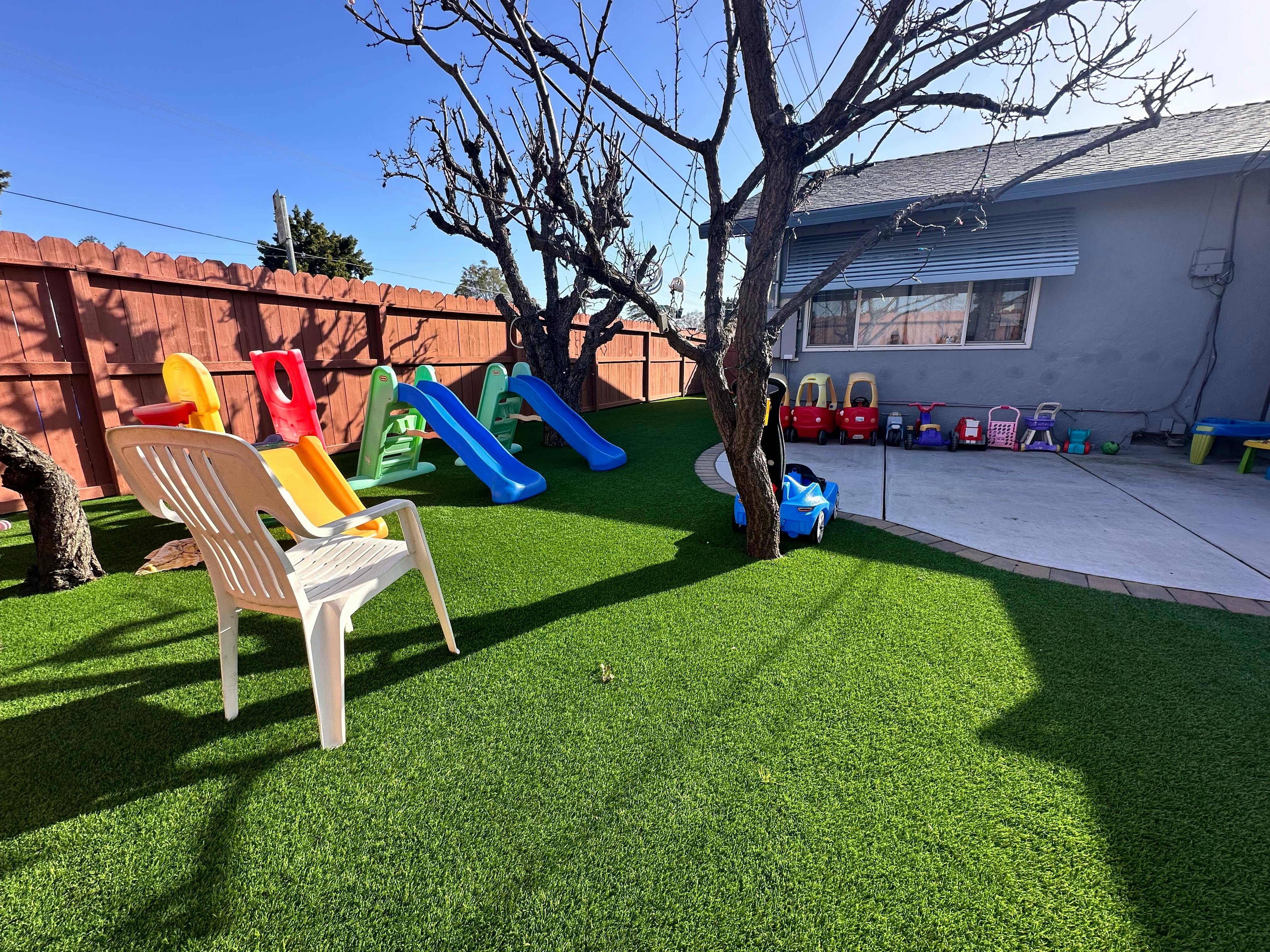 Playground with slides and artificial turf
