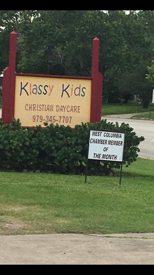 Sign for "Klassy Kids Christian Daycare" and "West Columbia Chamber Member of the Month"