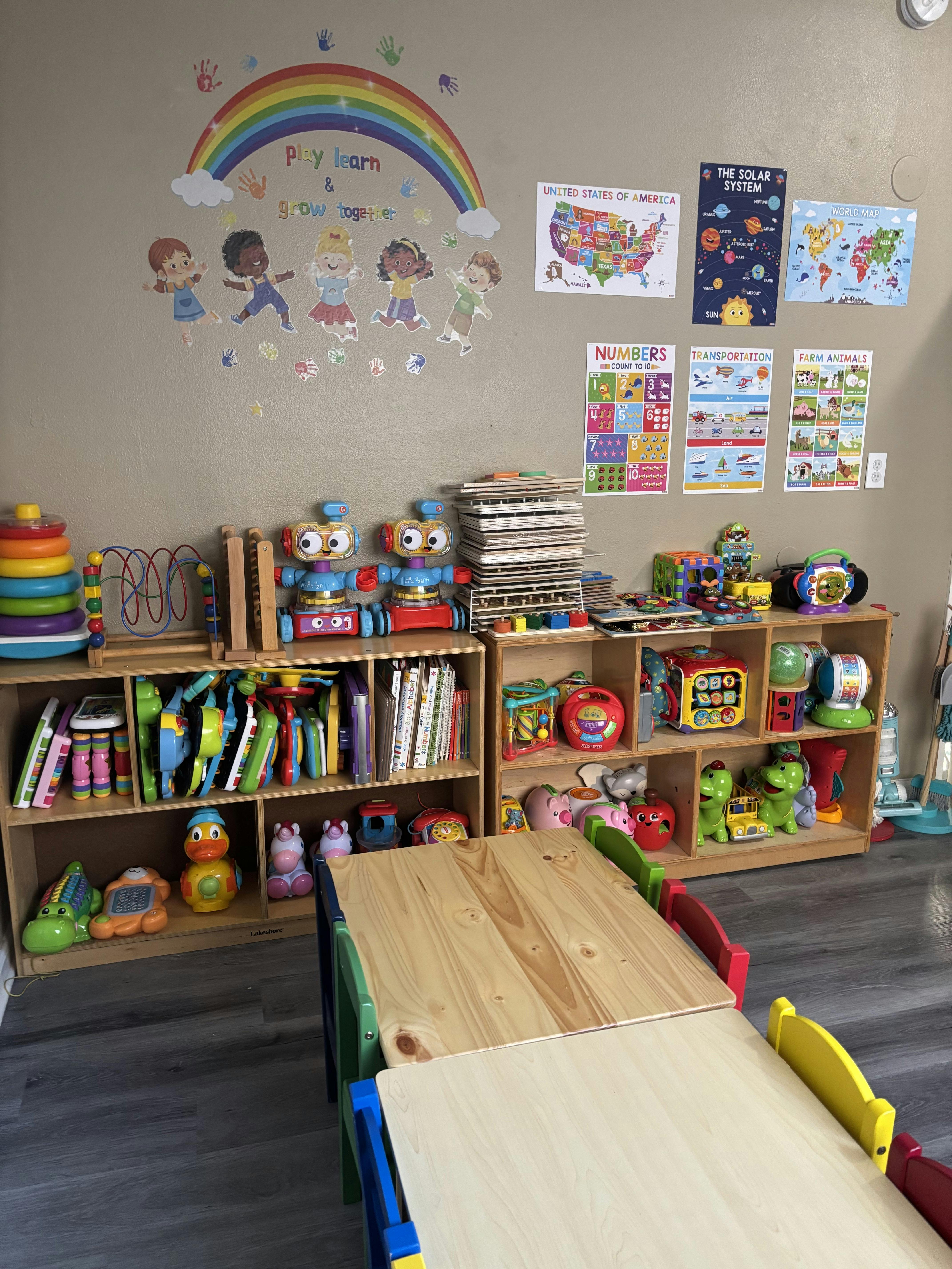 Classroom filled with toys, books, and colorful educational posters