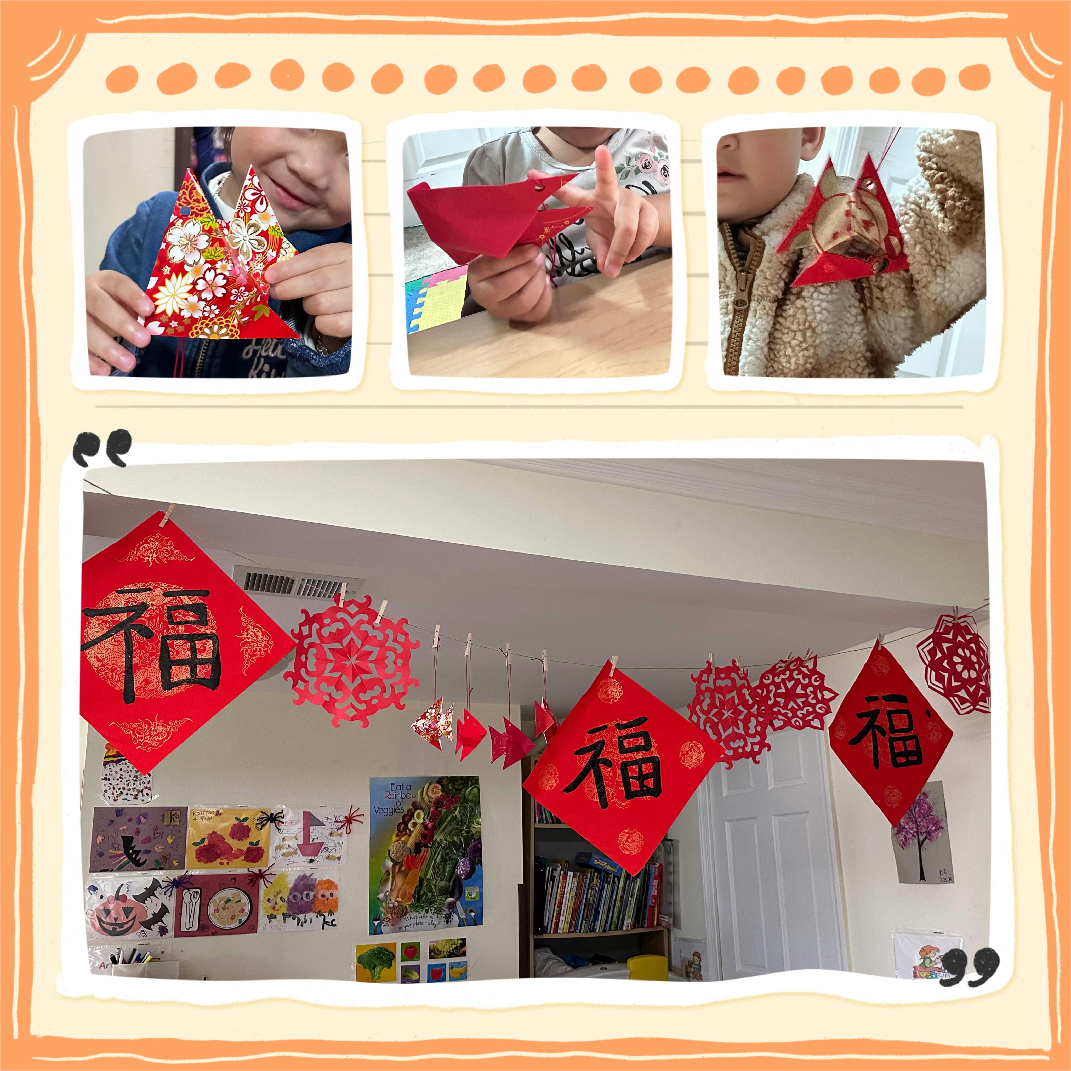 Child making paper crafts and red decorations hanging in a room