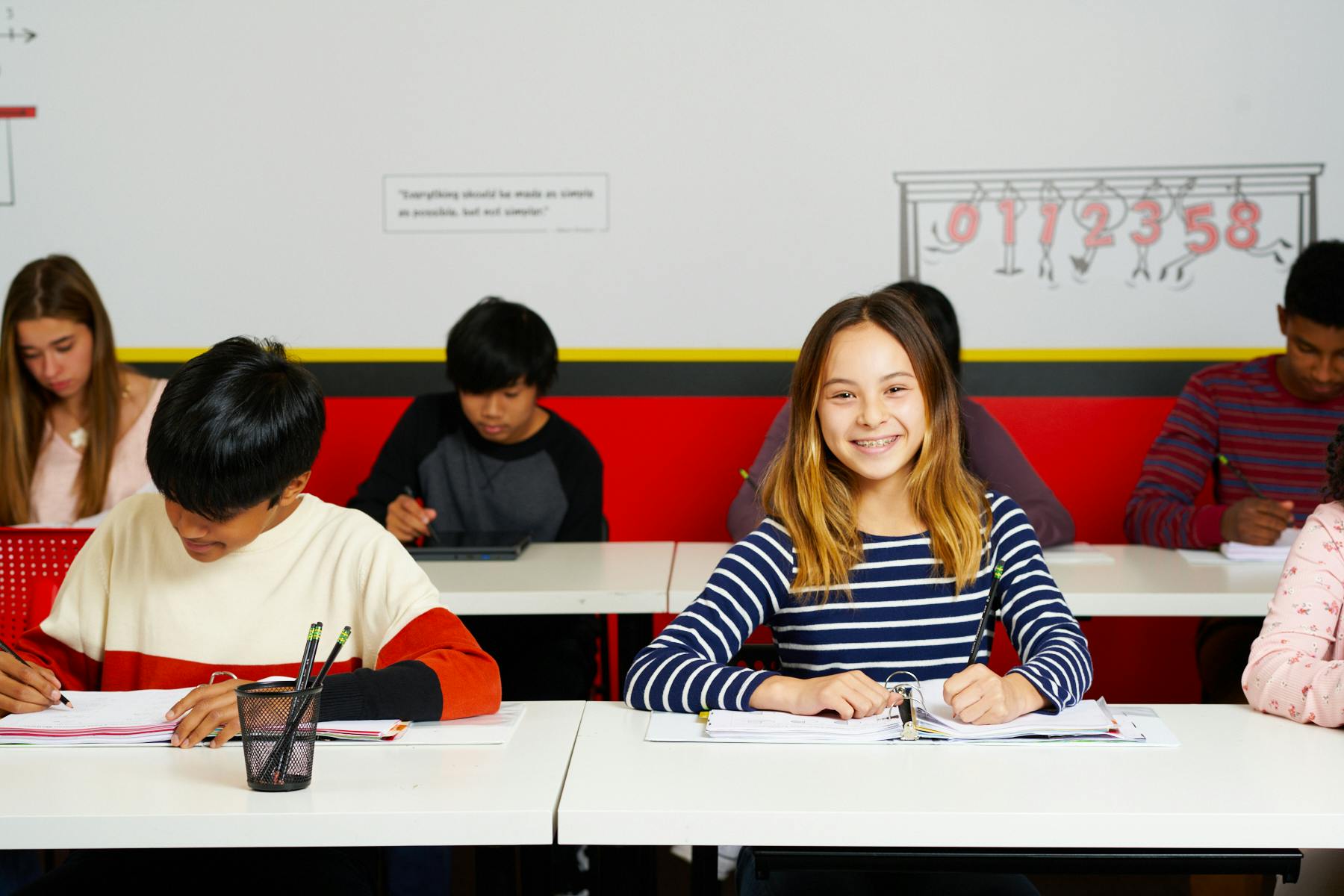 Students sitting at desks in a classroom