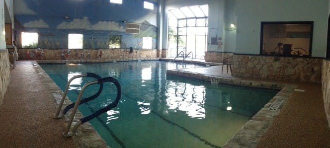 Indoor swimming pool with large windows
