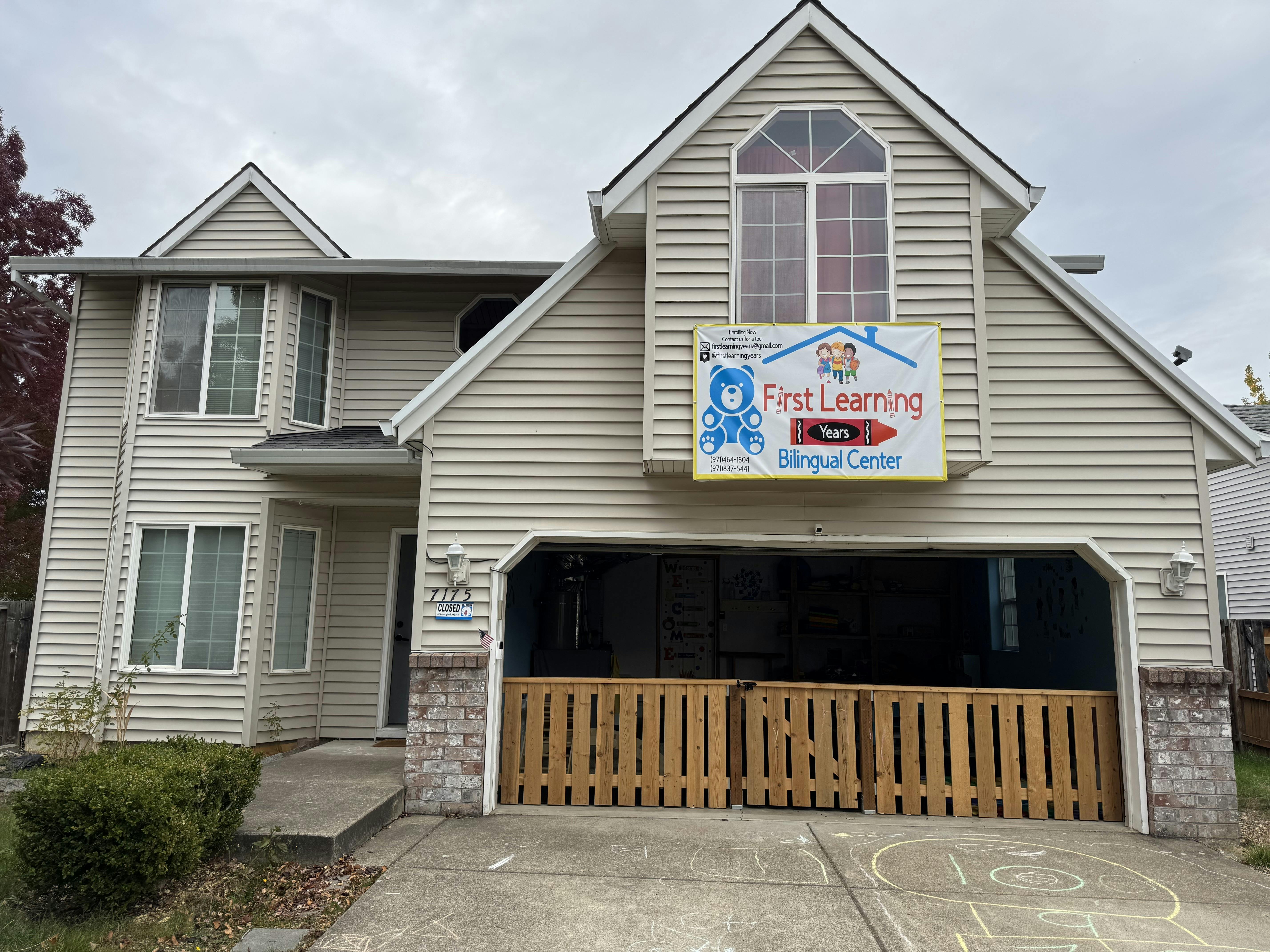 House with a sign that reads "First Learning Bilingual Center"