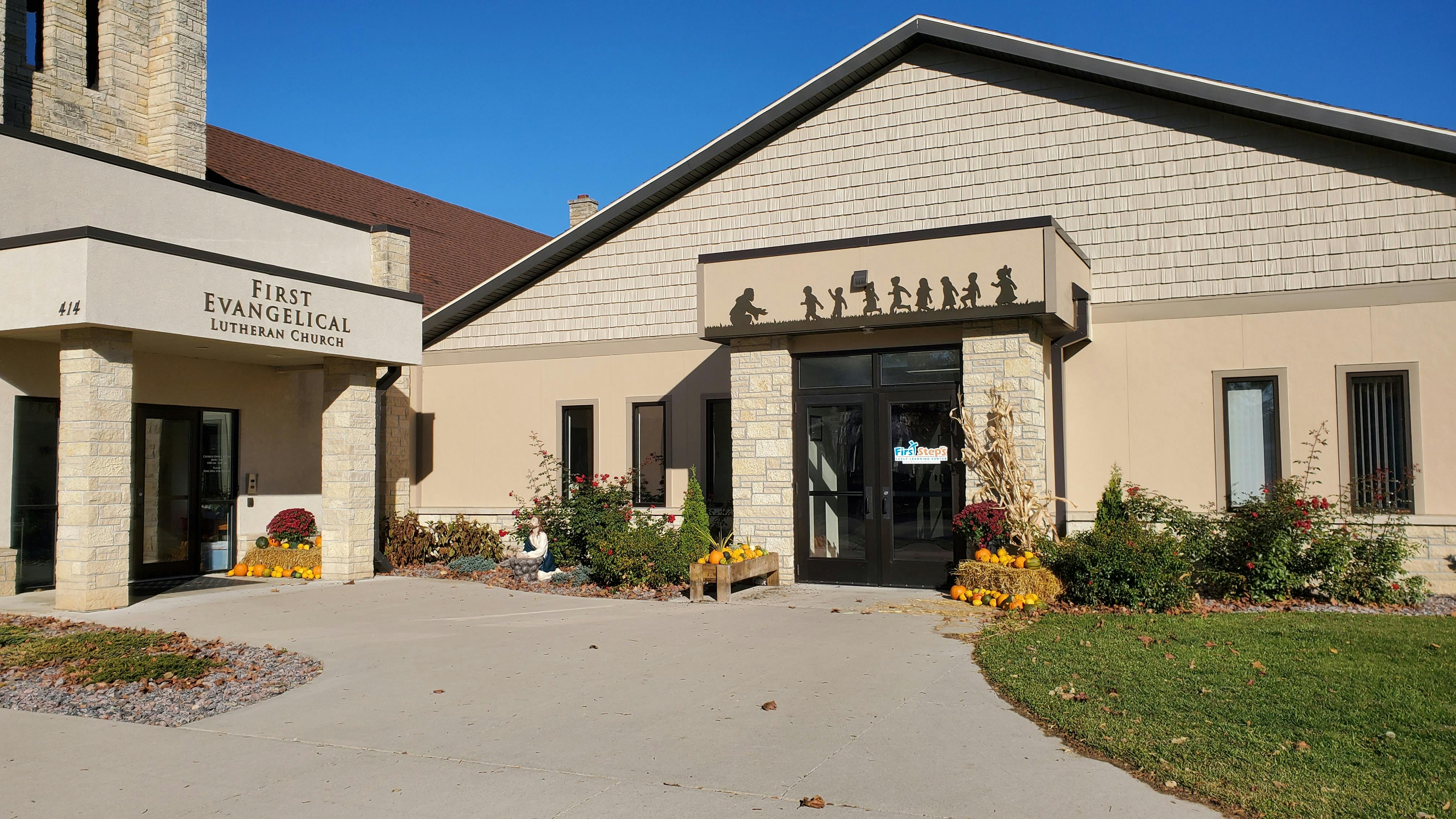 Exterior of a building with a sign that reads "First Evangelical"