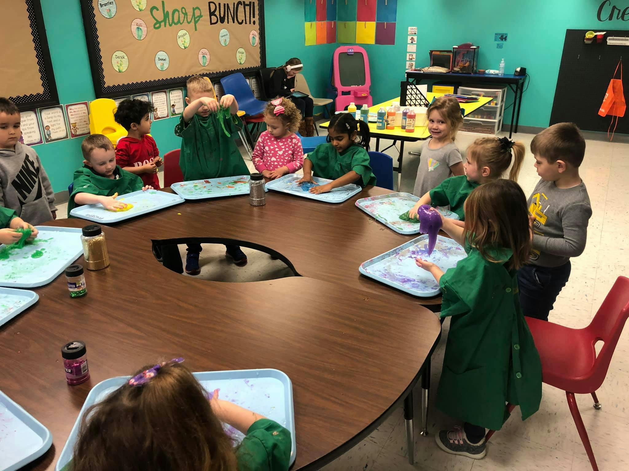 Children at a table doing an art activity