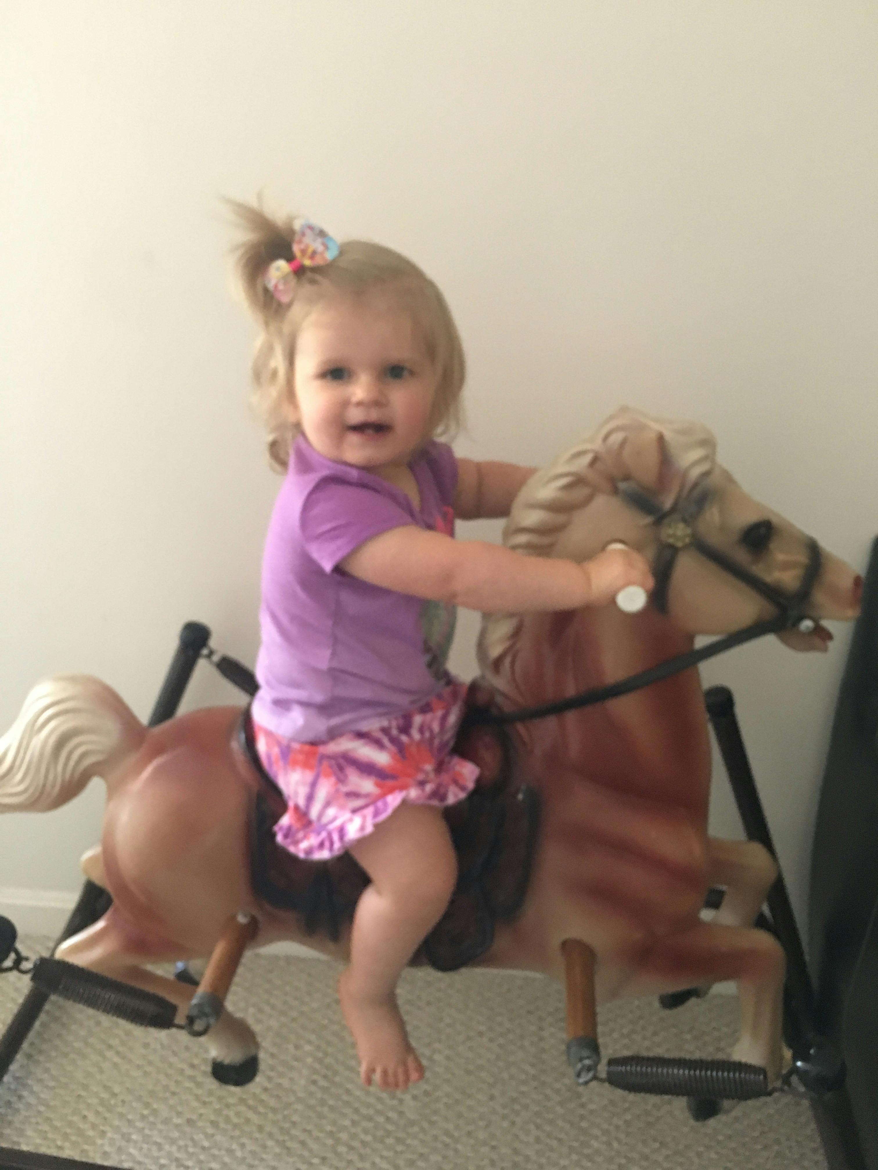 Child on a rocking horse