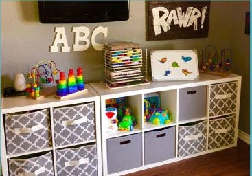 Storage shelves with toys and bins