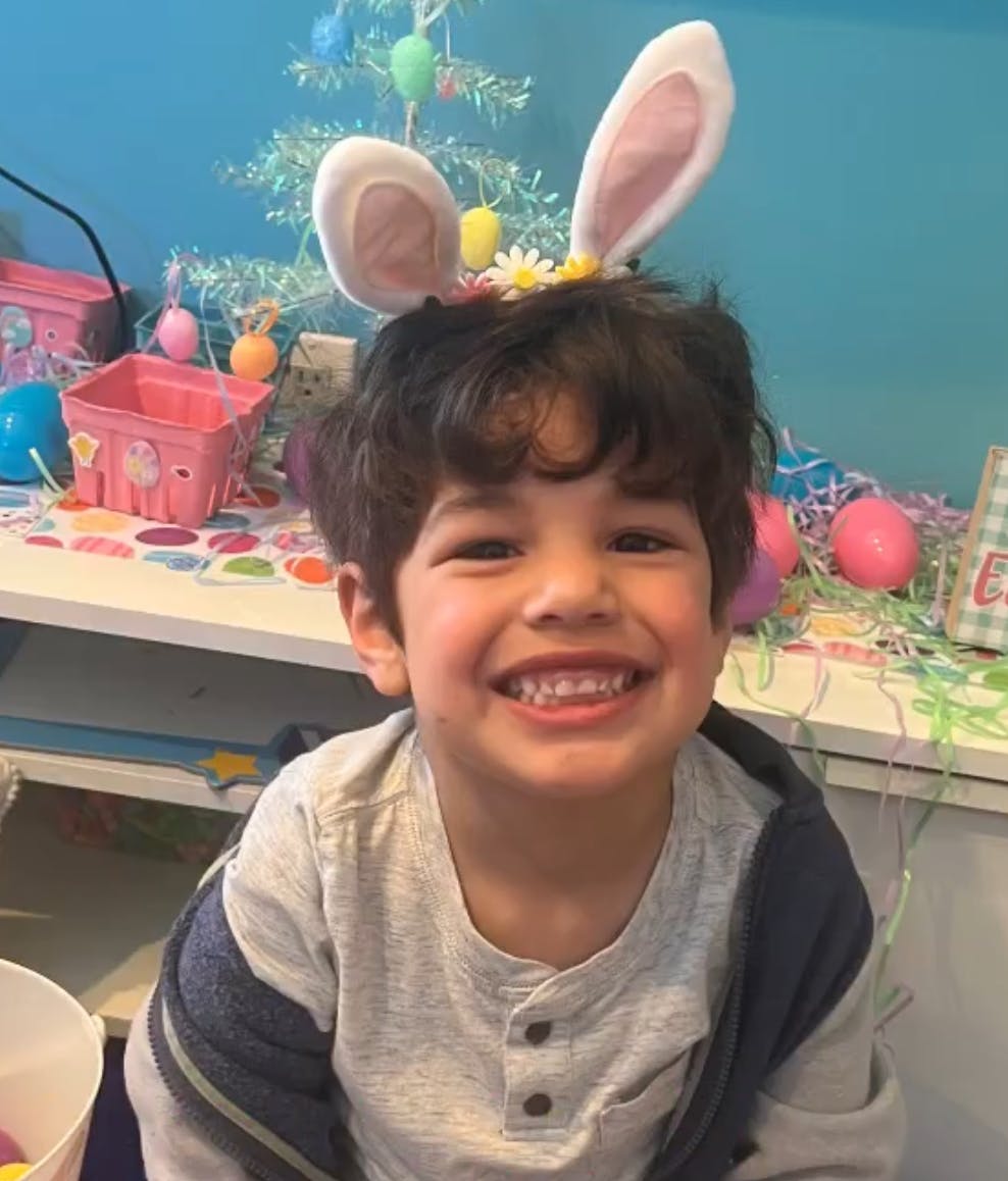 Child wearing bunny ears