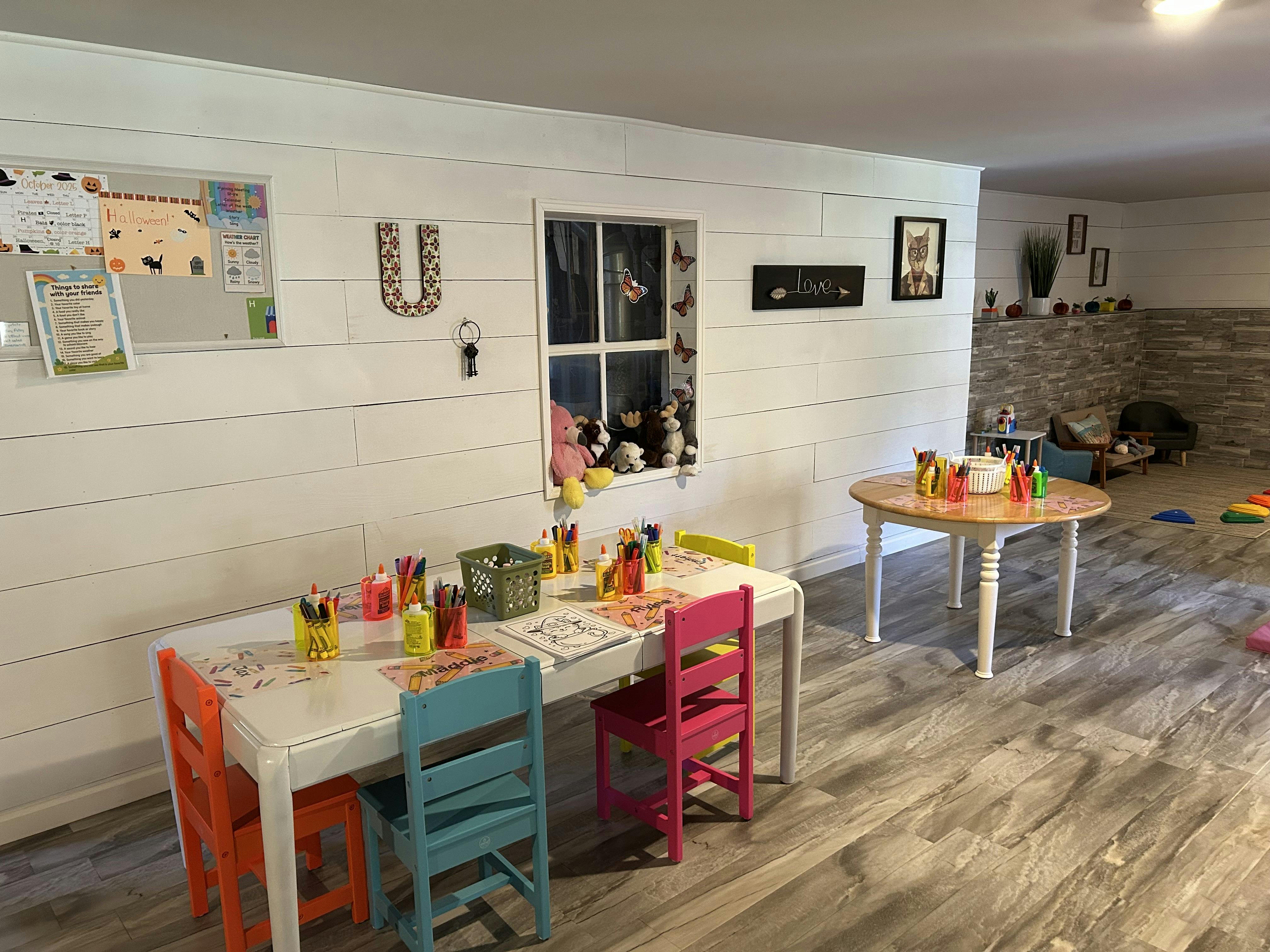 Children's activity room with tables and chairs