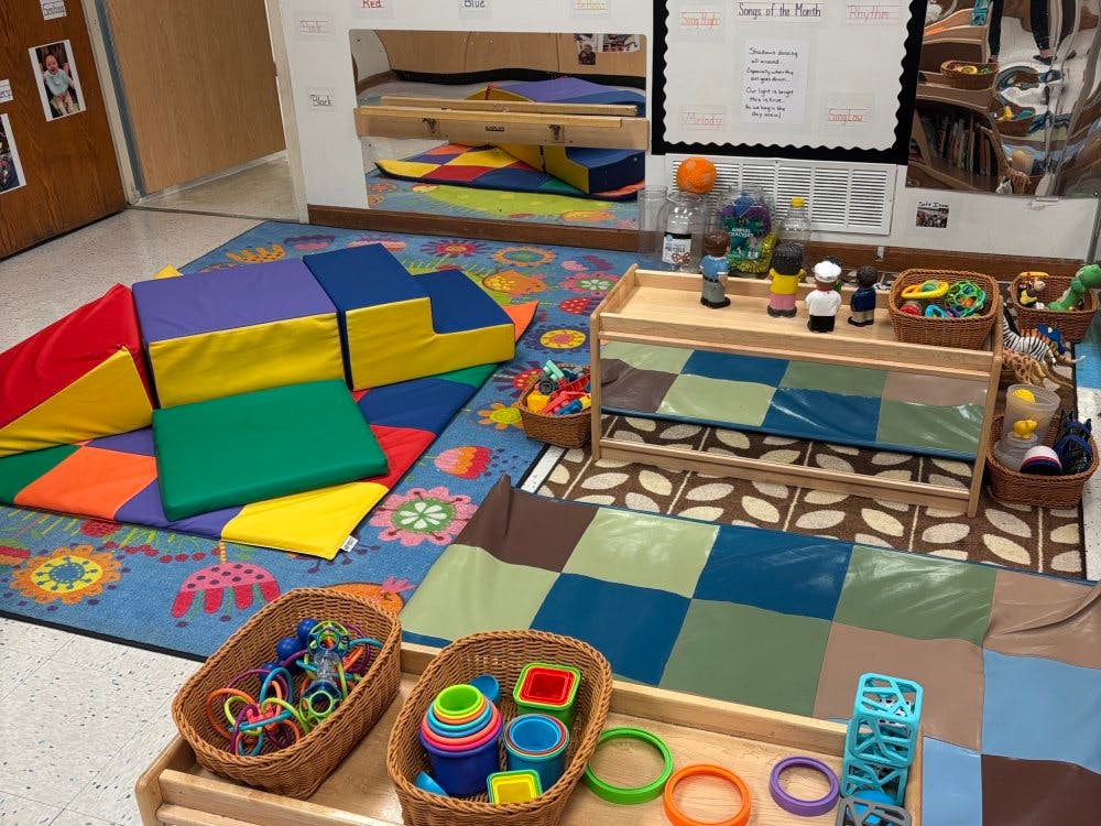 Colorful soft play equipment and sensory toys in a classroom