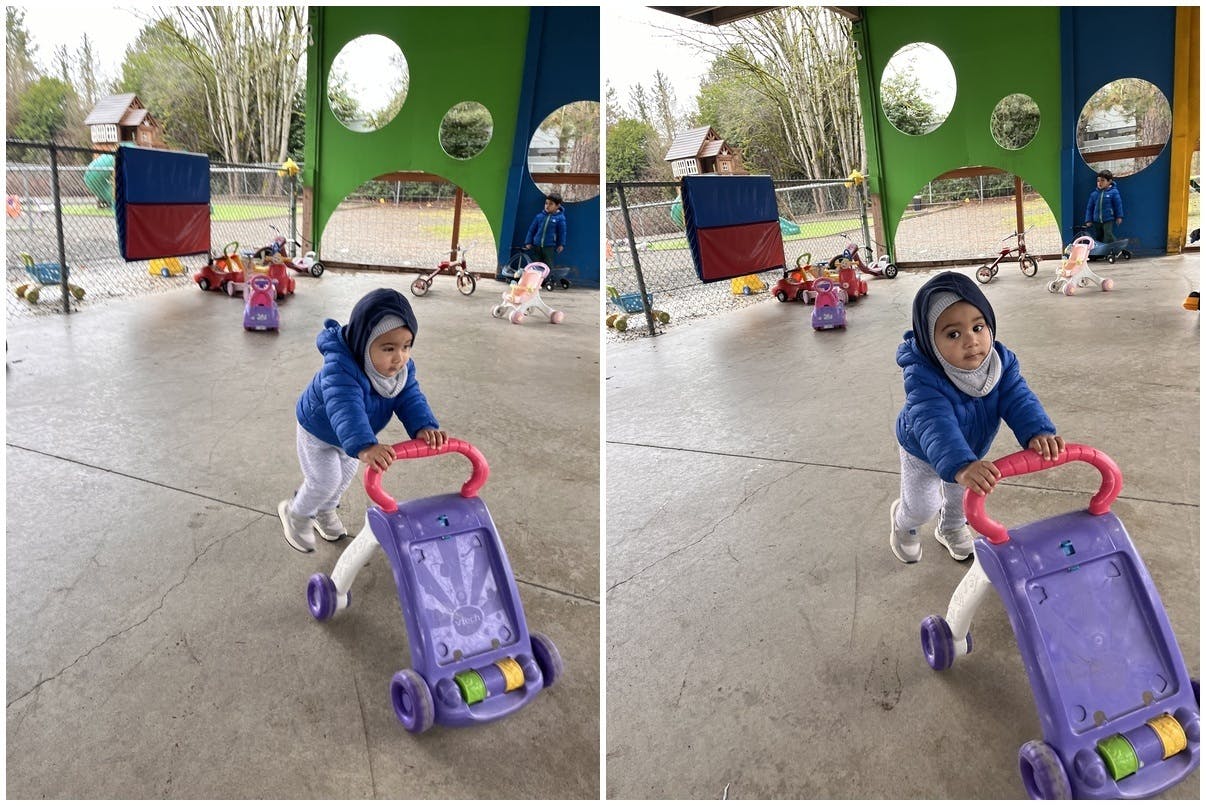 Child pushing a toy walker on a paved surface