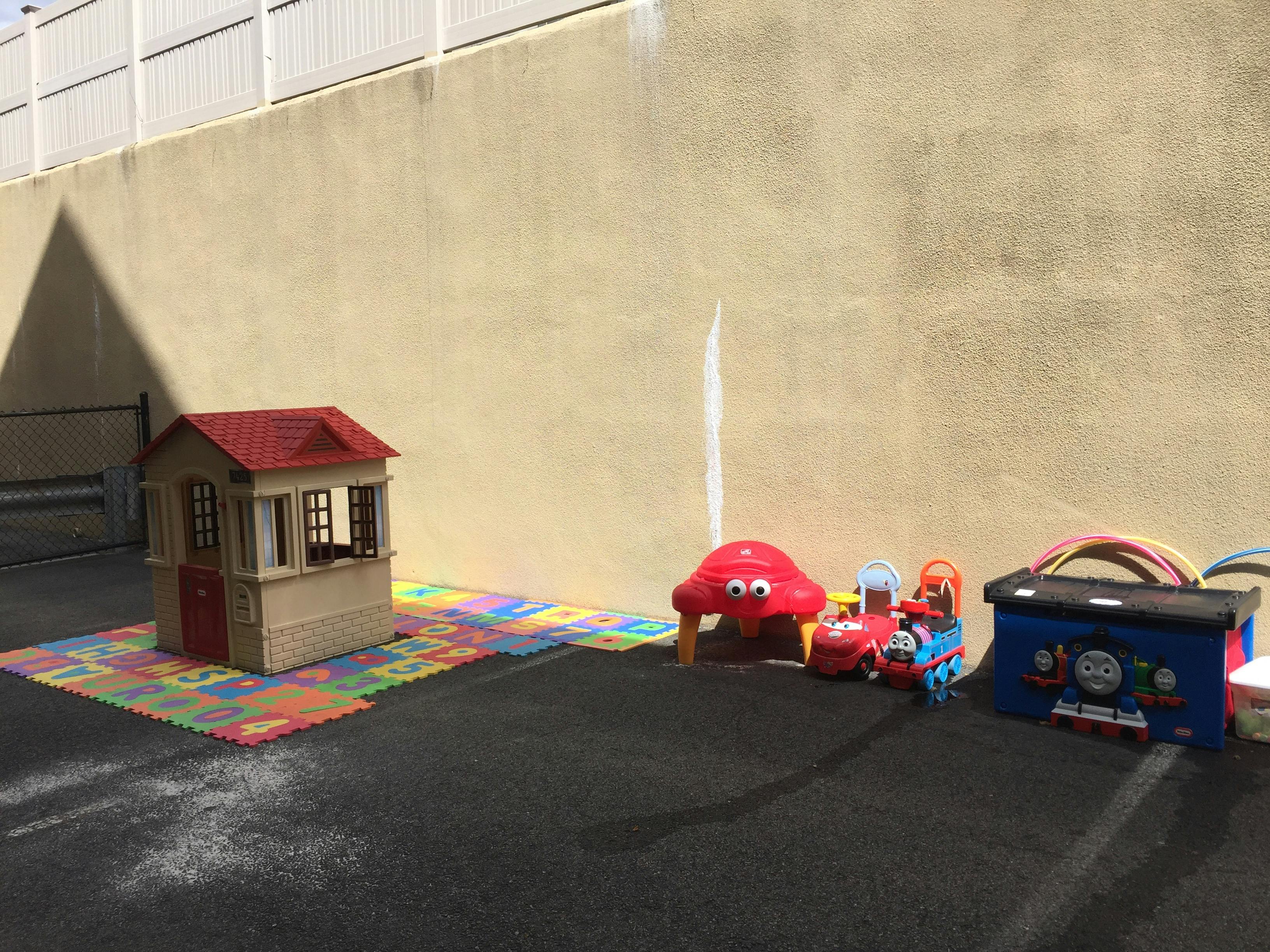 Playhouse and toys on a playground