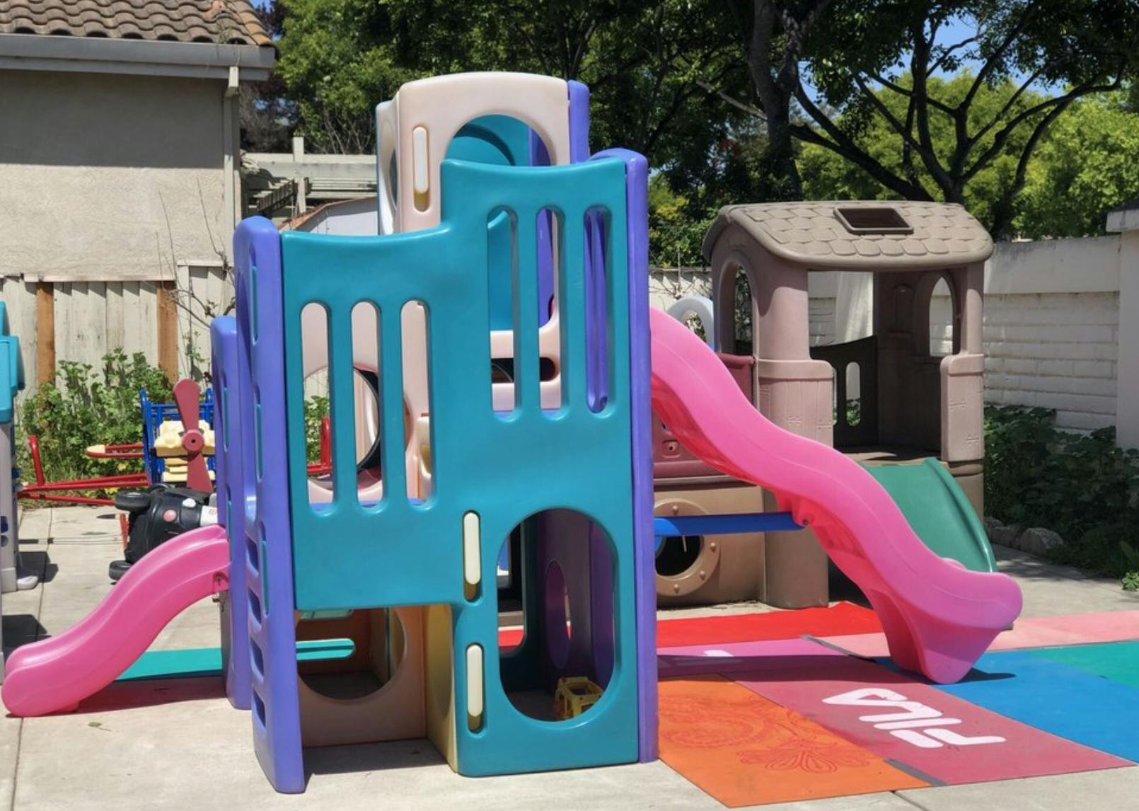 Playground structure with slides and climbing areas