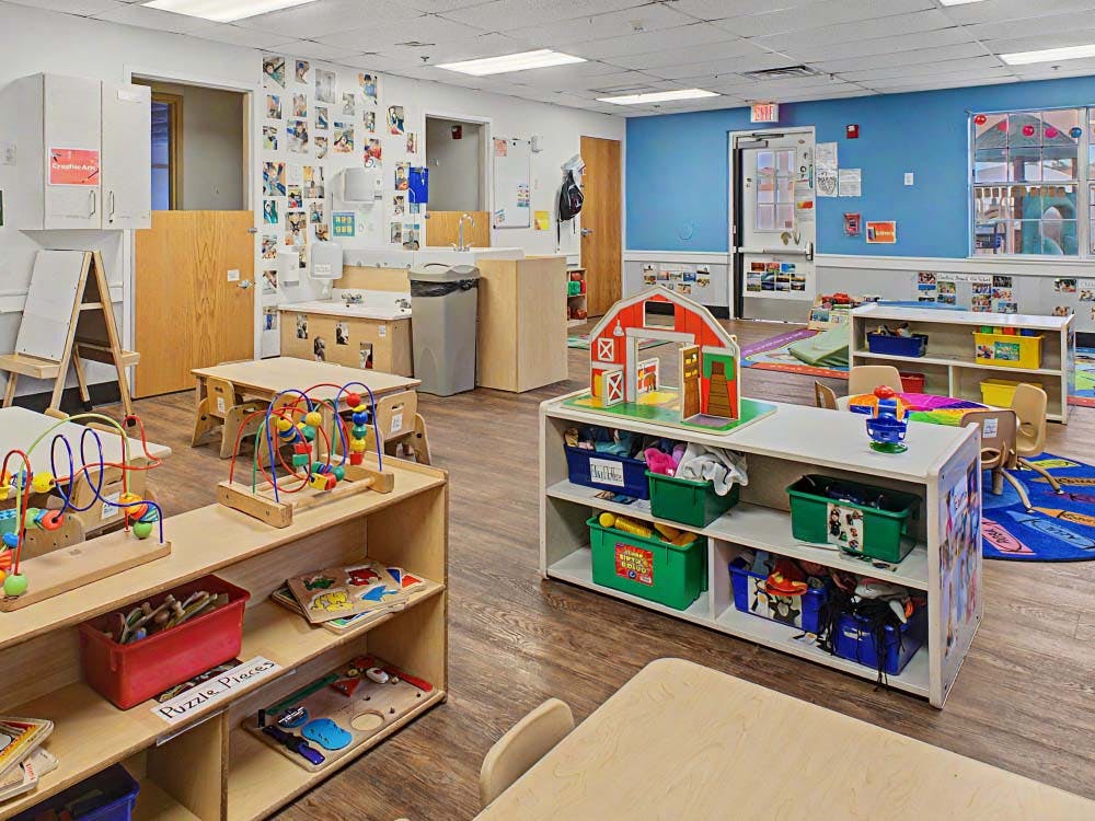 Empty children's classroom with toys and learning materials