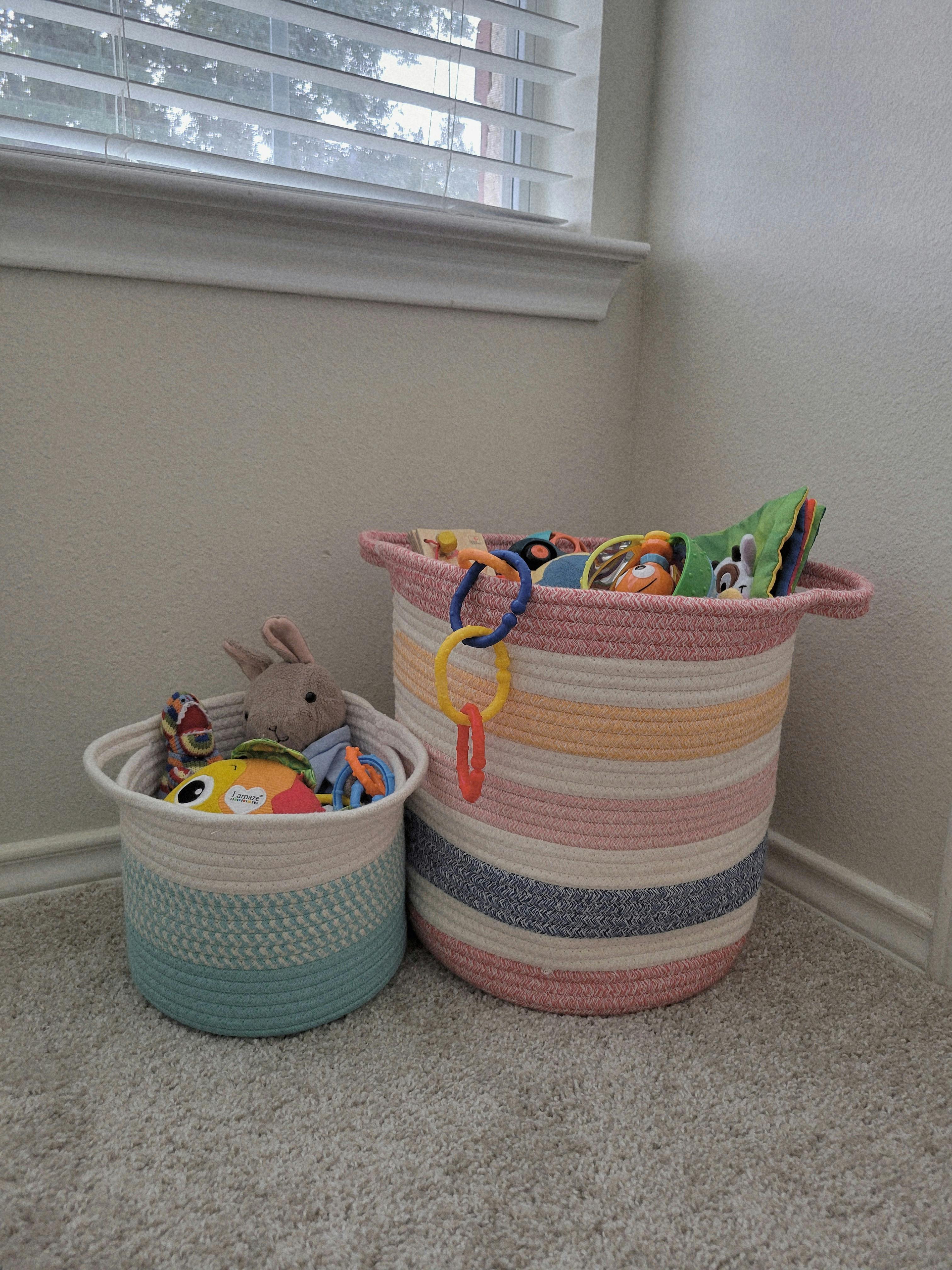 Two woven baskets filled with toys