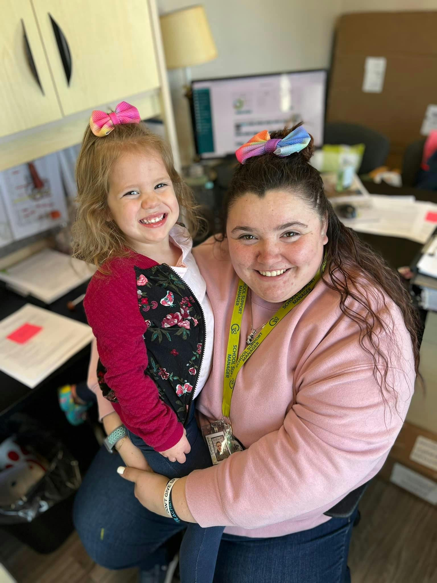 Adult holding a child