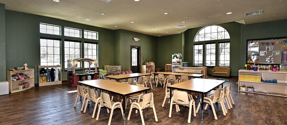 Classroom with small tables and chairs