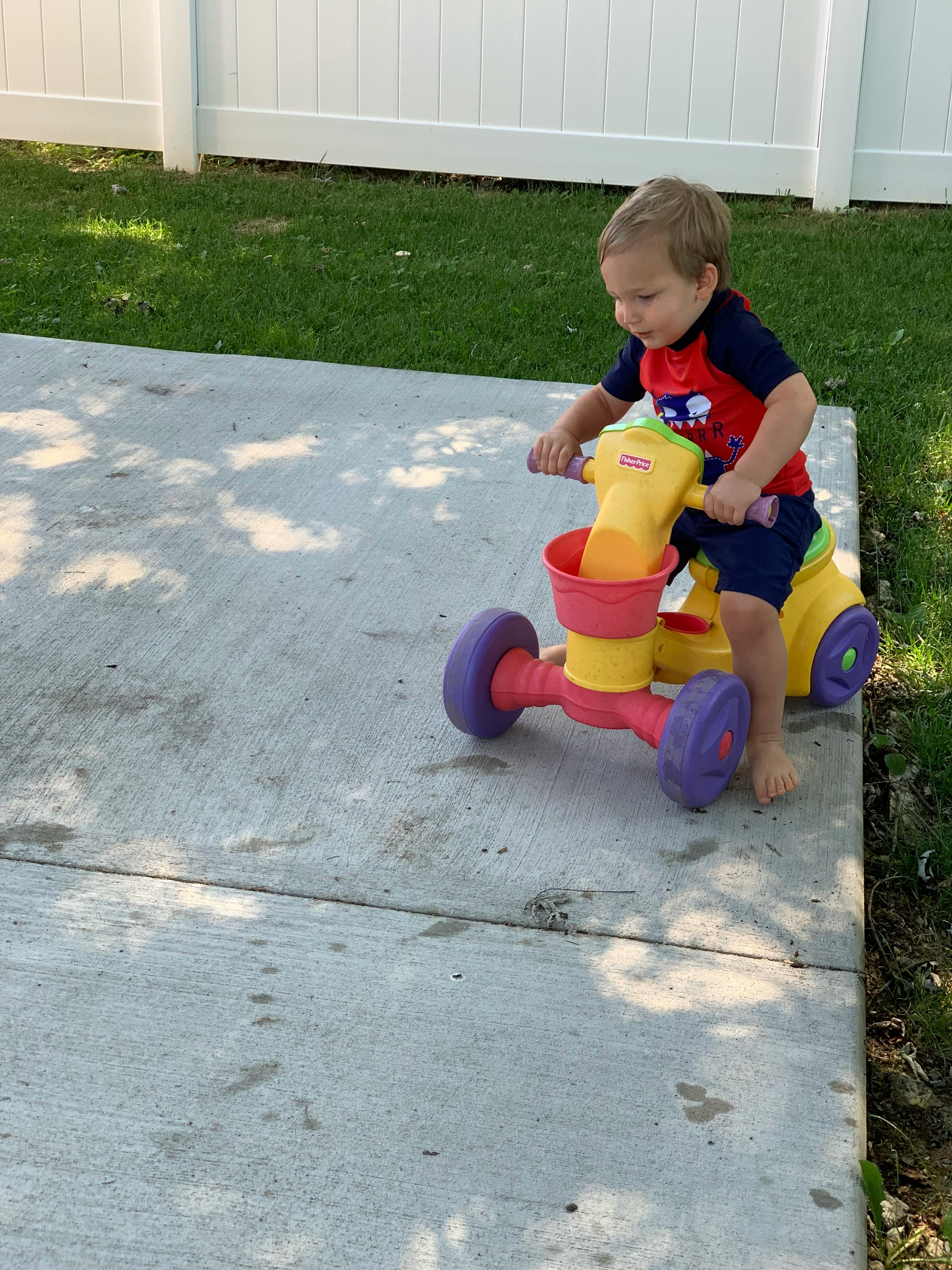 Child on a toy ride-on