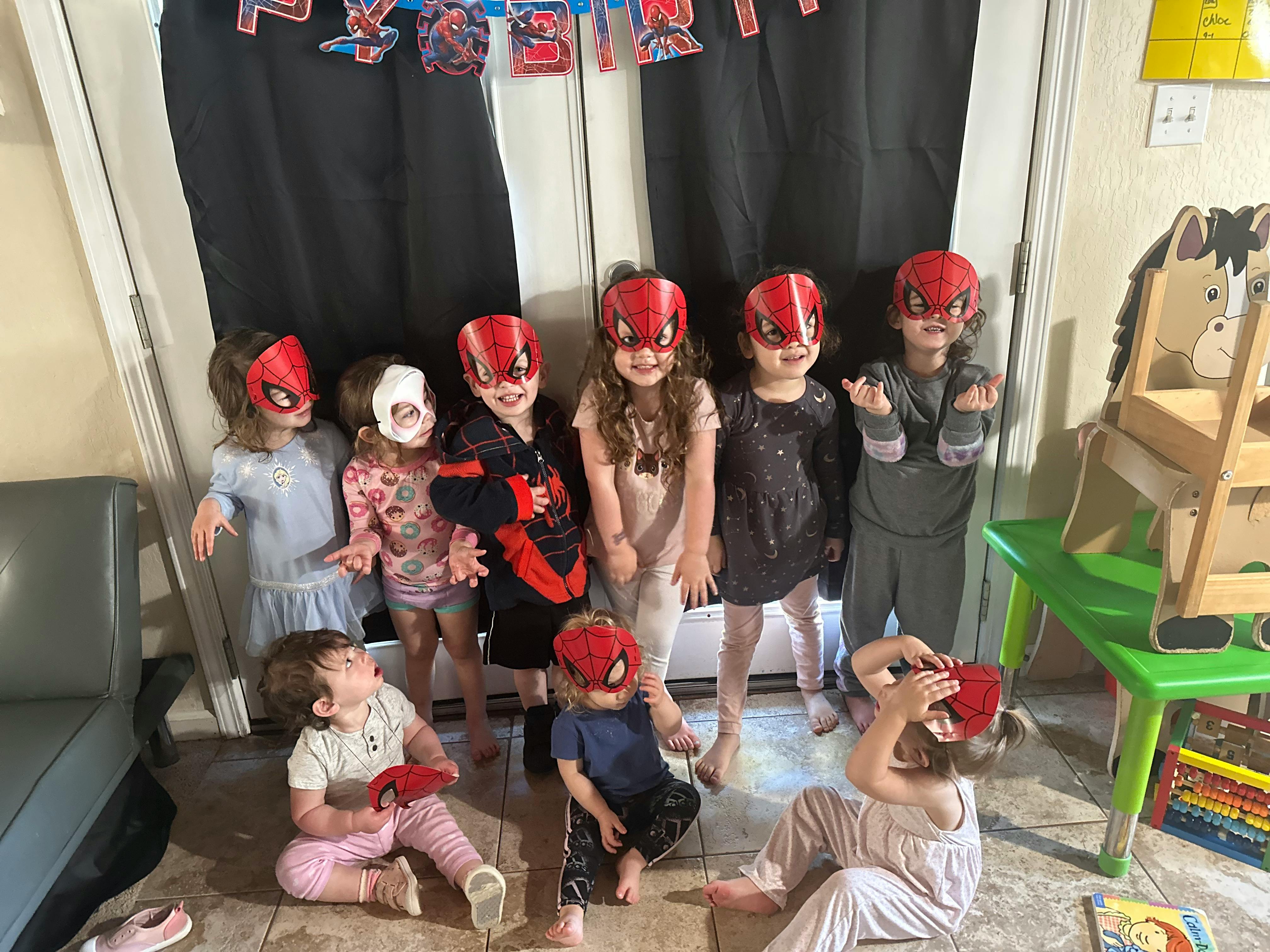 Group of children wearing red masks, full-face masks