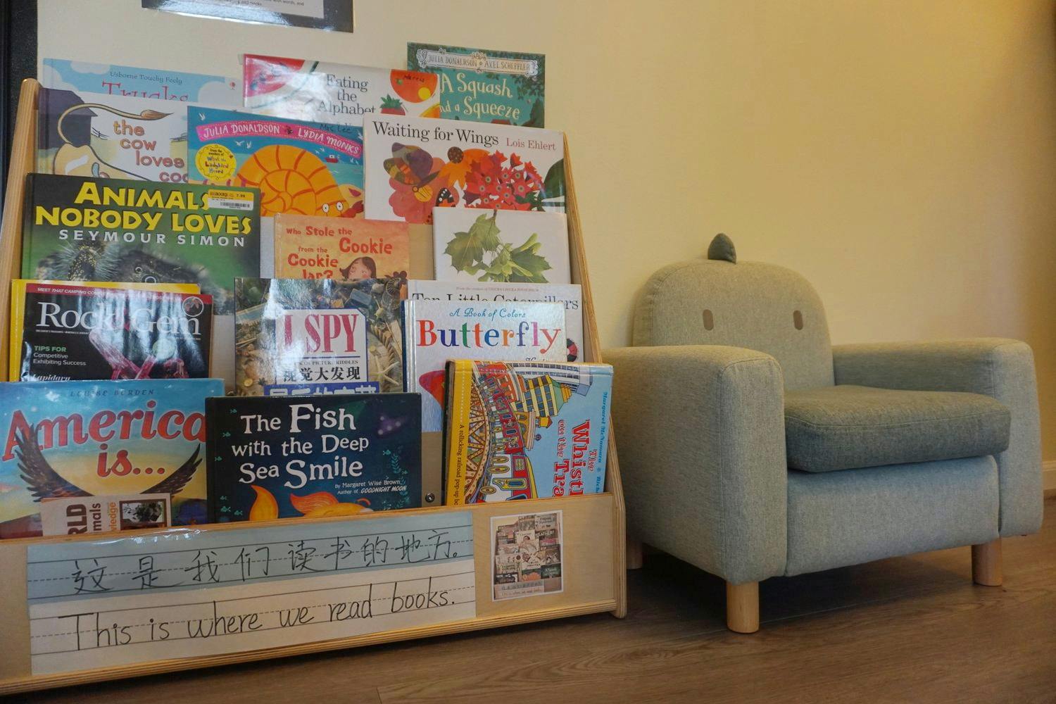 Children's book display and small armchair