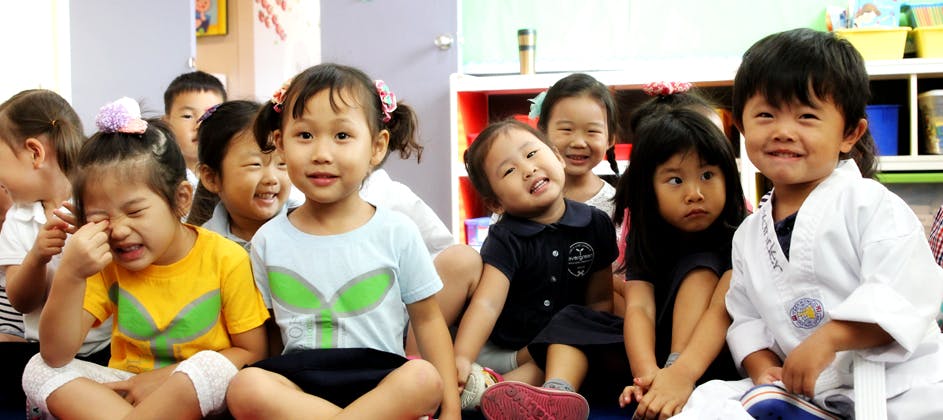 Group of children sitting together