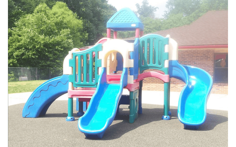 Colorful playground structure with multiple slides