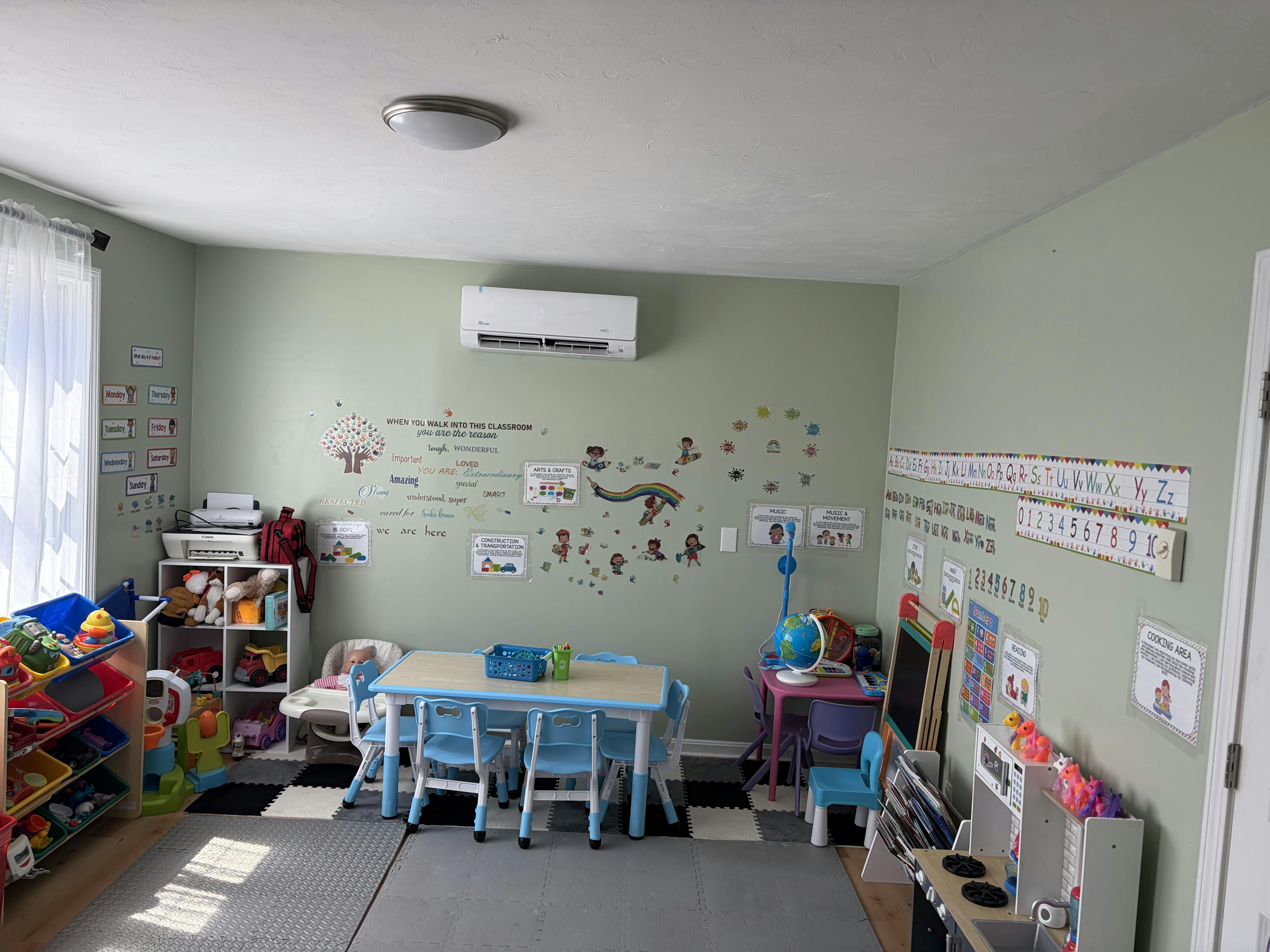 Classroom interior with small tables and chairs for children