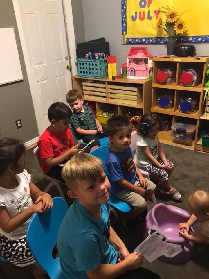Children sitting in a classroom