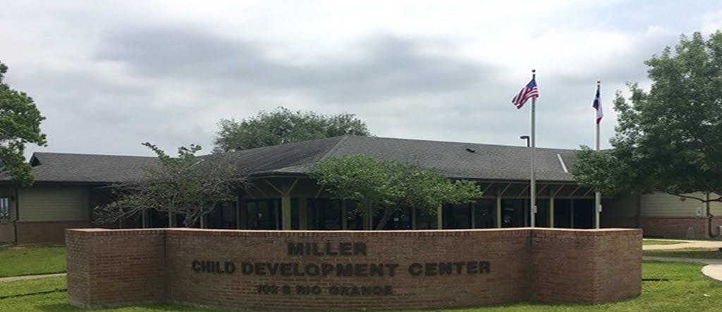 Miller Child Development Center sign in front of a building