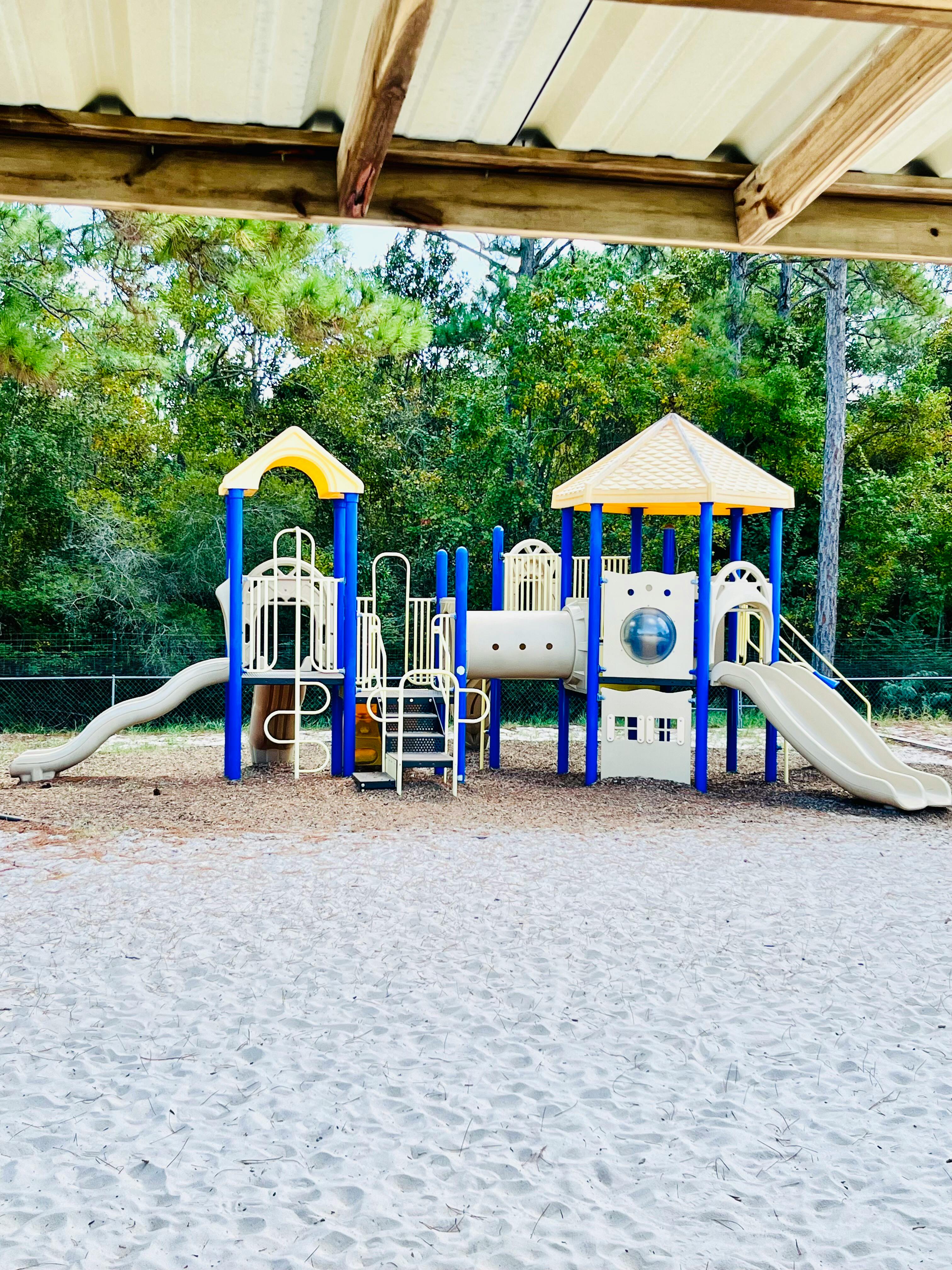 Playground with slides and climbing structures