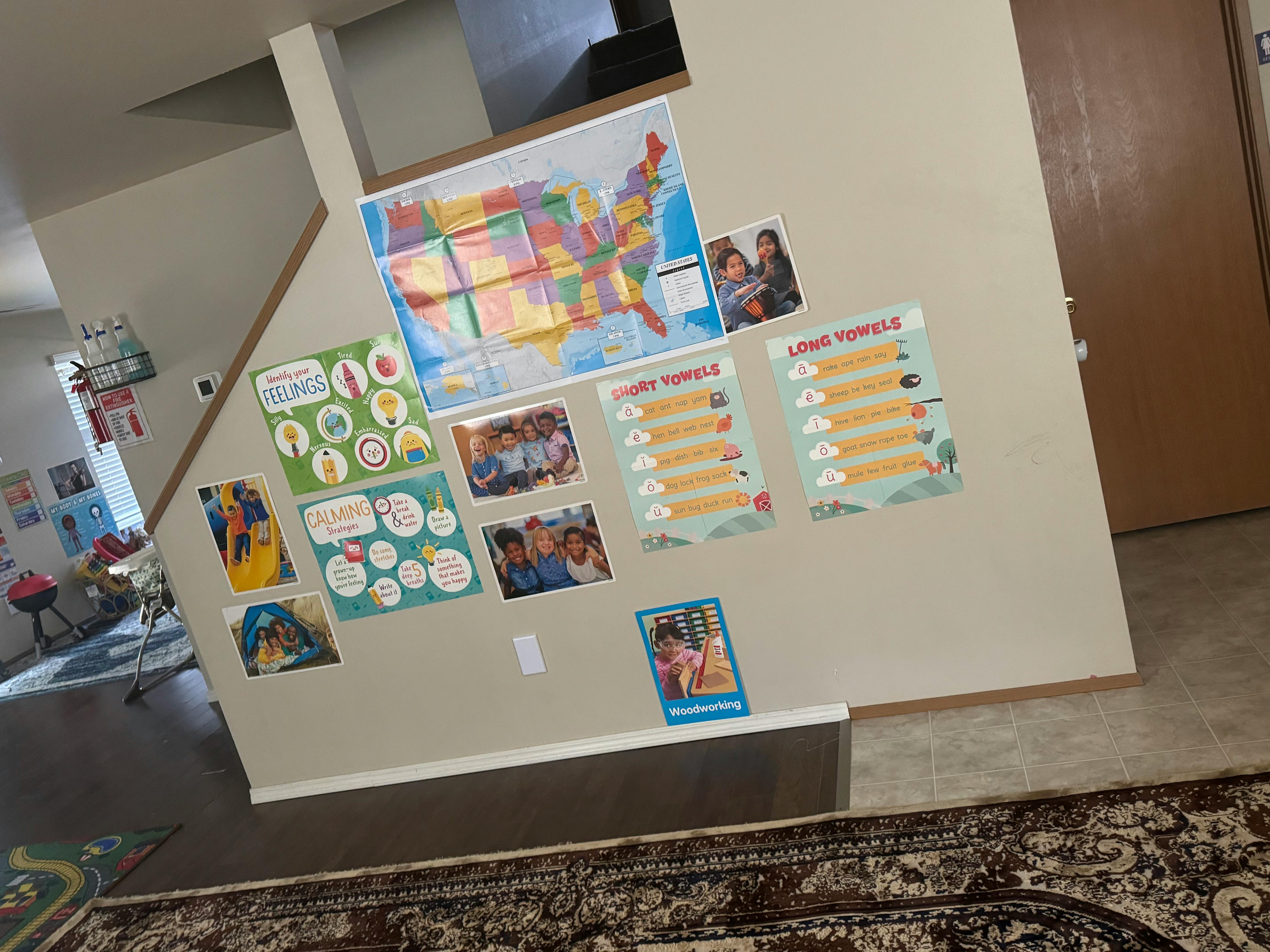 Wall with a map of the United States and other educational posters