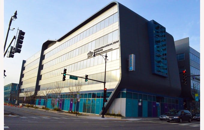 Modern building with curved facade and multiple windows