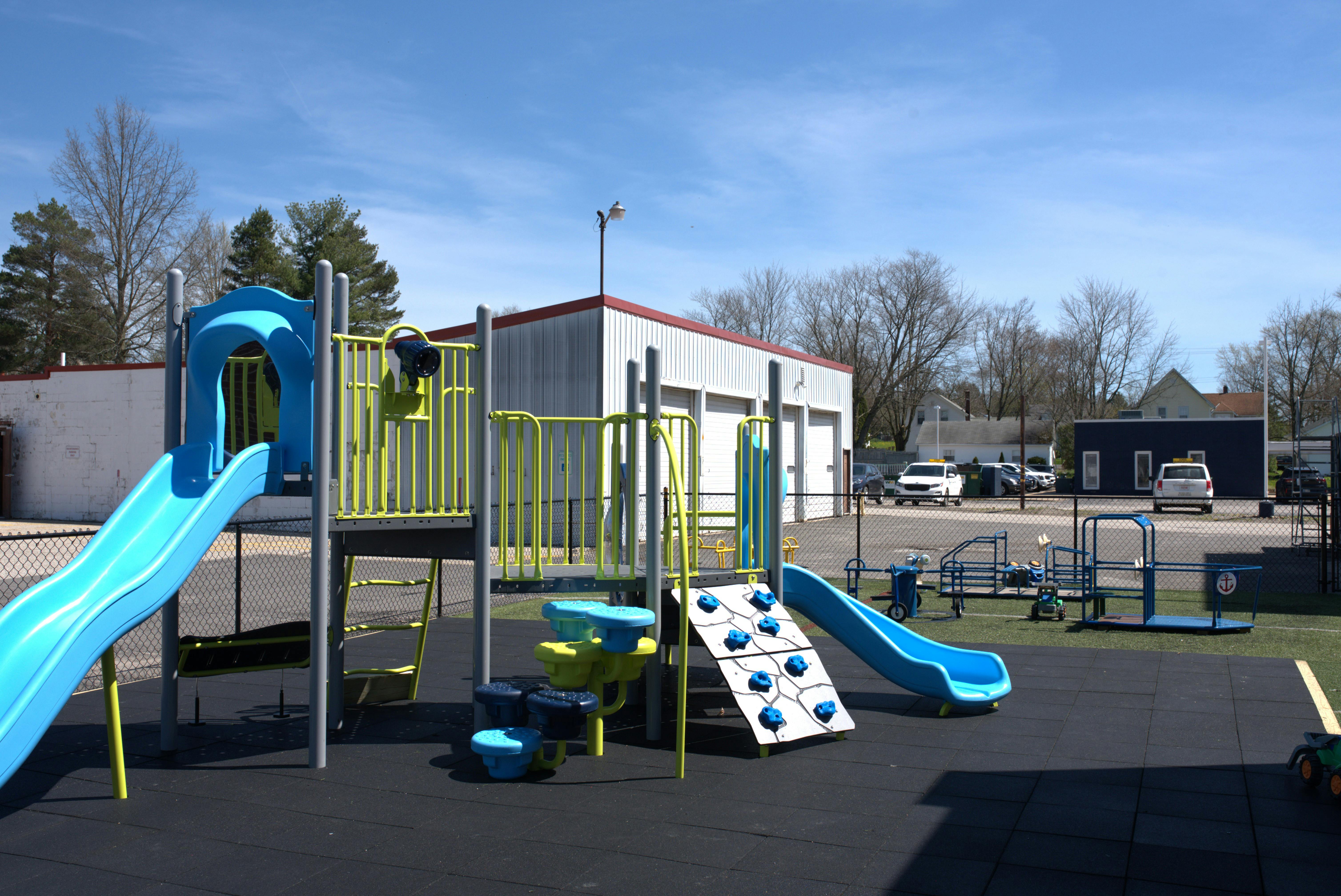 Playground with blue and yellow equipment