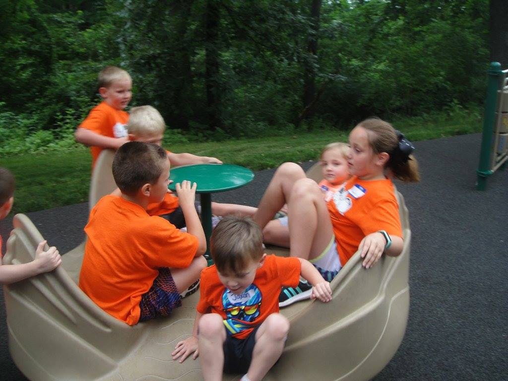 Children playing on a playground structure