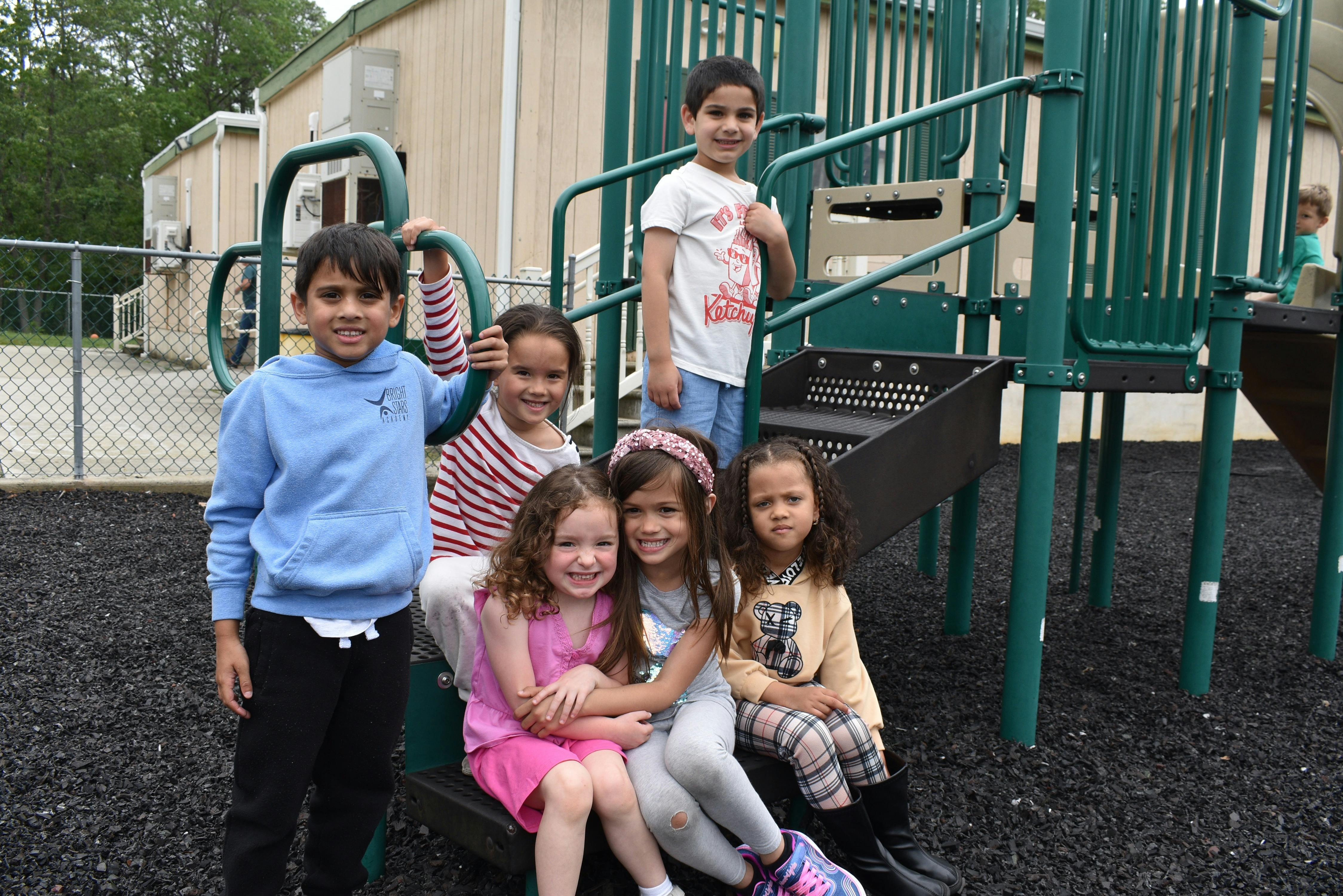 Group of children on a playground structure